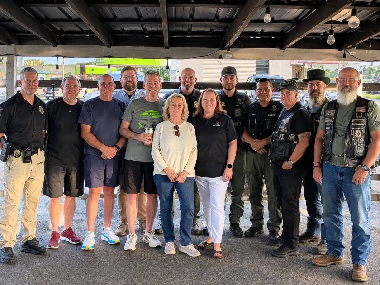 Elevate Autism leaders standing with Adairsville Police Department officers